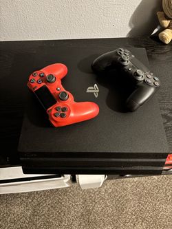Sony PlayStation 4 Pro with Two Controllers