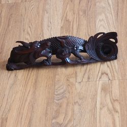 Vintage hand carved wood Chinese dragon with bone and glass inserts. 