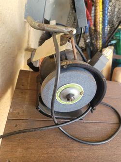 Table with blade sharper machine