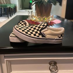 Checkered vans slip ons 
