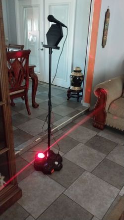 SINGSTATION BLUETOOTH KARAOKE SYSTEM  WITH 2 MICS IS LOUD USED ONCE IS IN EXCELLENT CONDITION
