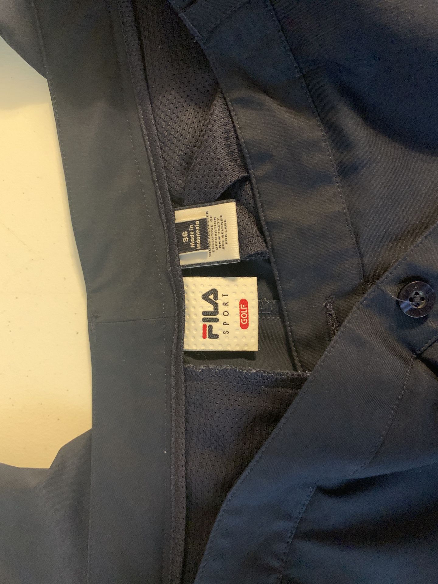 Two Pairs of Mens Fila Pants Blue and Khaki 36 waist Sale in Wheaton, IL OfferUp
