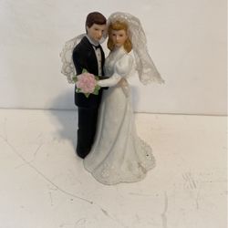 Bride And Groom By Lifton. Four and half inches.