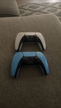 Two PS5 DualSense Controllers White and Blue