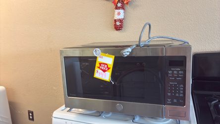Like new GE stailenss steel microwave