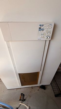Electric pet door w/collar attached to backdoor