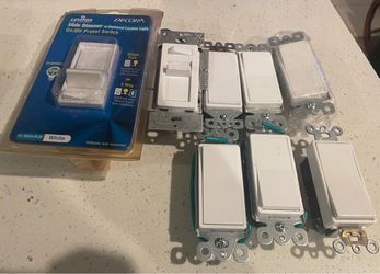 2 slide dimmers and switches.  electrician lot