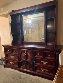 Wooden dresser with mirror