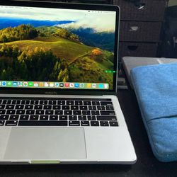 Apple MacBook Pro W/Touch Bar Practically NEW!!