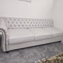 Low Profile Ivory Tufted Sofa