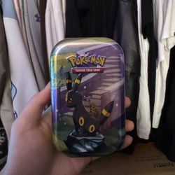 Prismatic Evolutions Tin