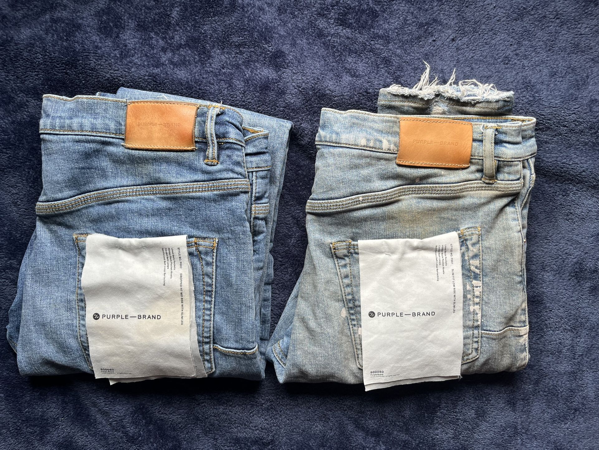Two Pairs Of Purple Jeans