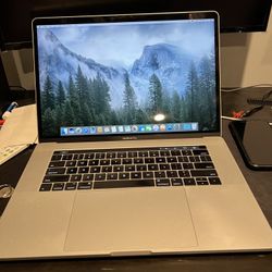 Macbook Pro 2017 15” Retina display And Touchbar 