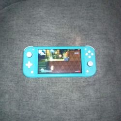 Nintendo Switch Lite w/ 2 Games