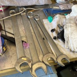 Four large Combination wrenches