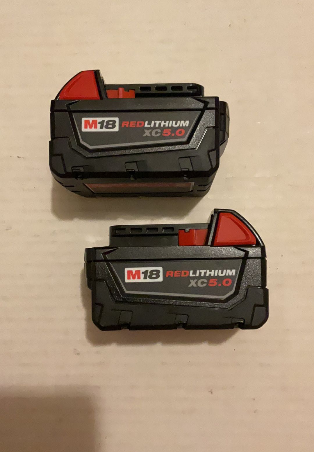 Brand New Milwaukee M18 Red Lithium XC 5.0 AH Batteries. 130 Firm on Price. 130 Firme en Precio.