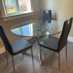 Glass & Chrome Dining Table With 4 Grey & Chrome Chairs