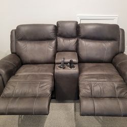 2 seated Electric Sofa with drink holder - rarely used