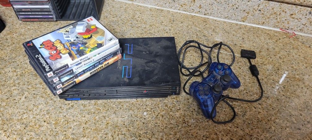 ps2 with original controller wires and games