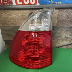 04-06 BMW E53 X5 NEW GENUINE LEFT DRIVER SIDE TAIL LIGHT 