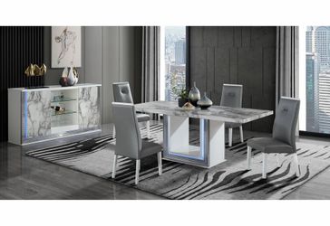 Stunning Dining set features White marble top & led lights on the base