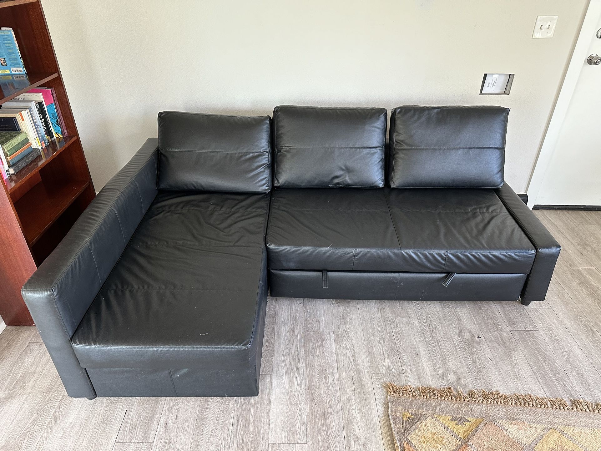 Faux Leather Sectional With Pull Out Bed