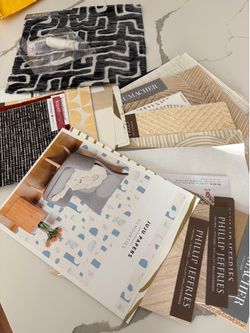 Samples of fabric and wallpaper