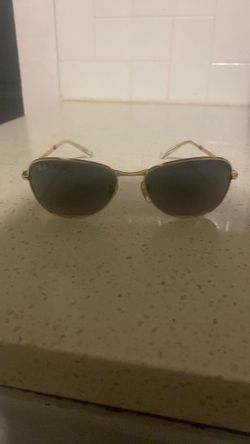 Brand is Ray-Ban sunglasses