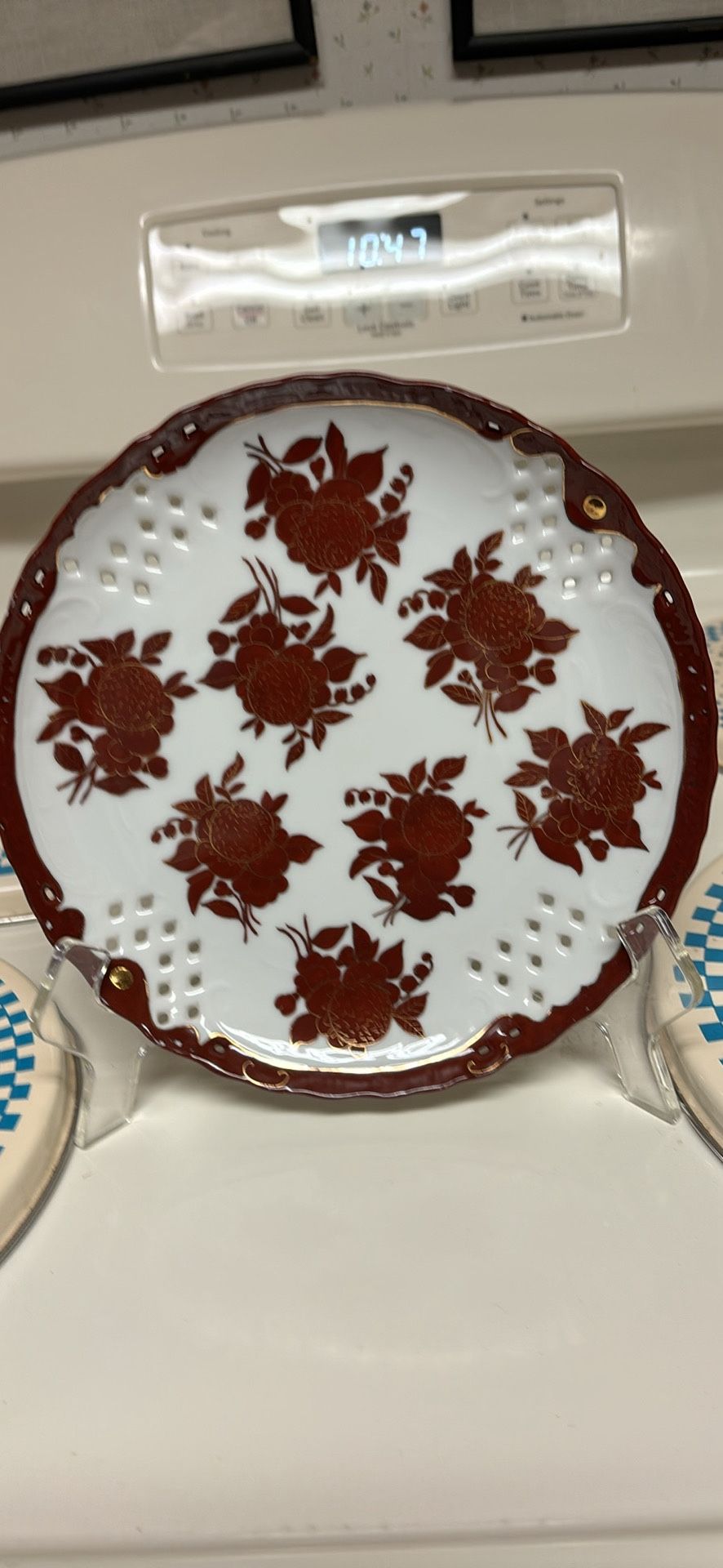 Vintage Japanese porcelain 8” plate deep mahogany red Flowers Trimmed In Gold