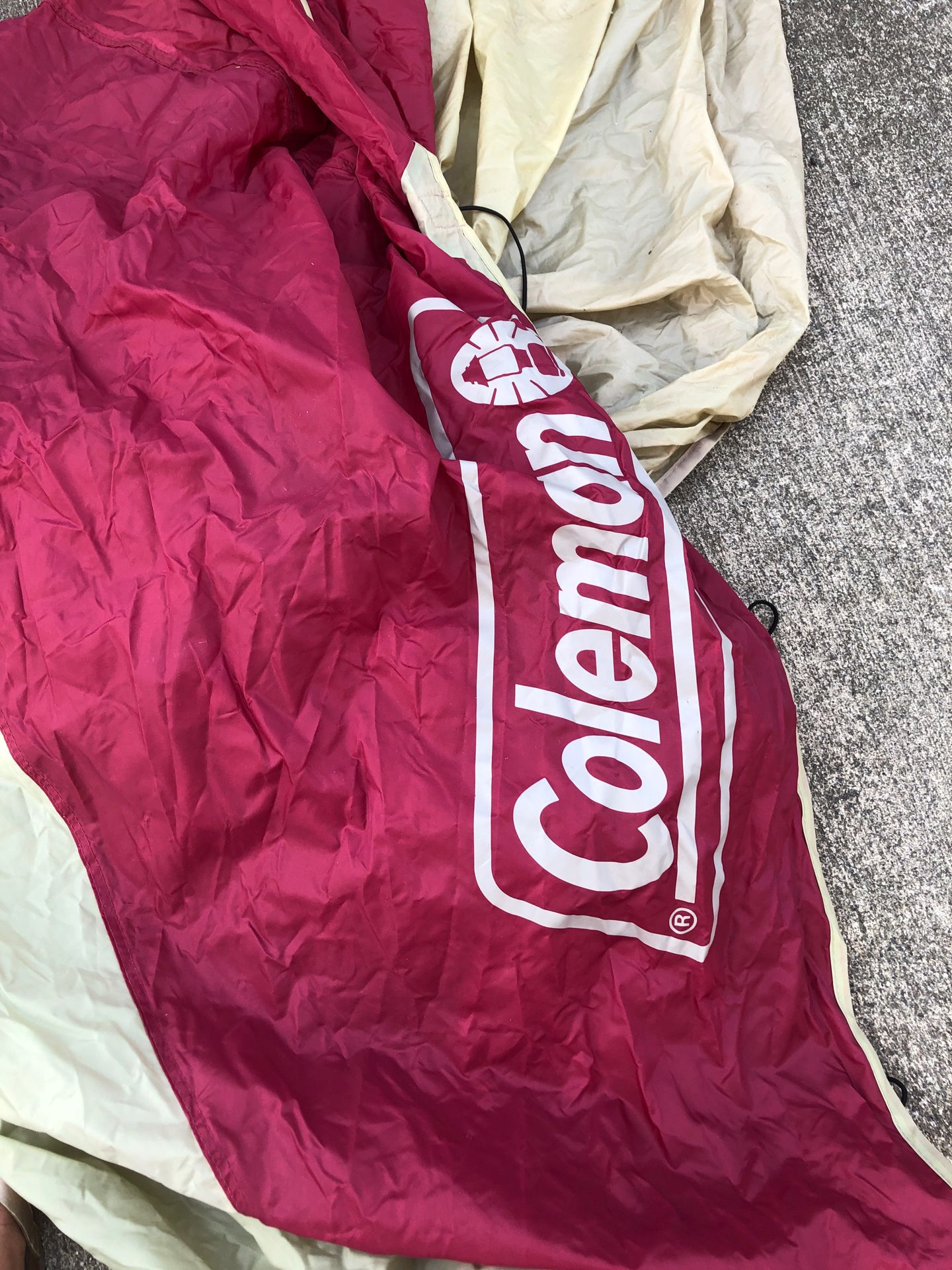 Red Coleman brand rain cover for tent size 80X124 inches long perfect for outdoors tent