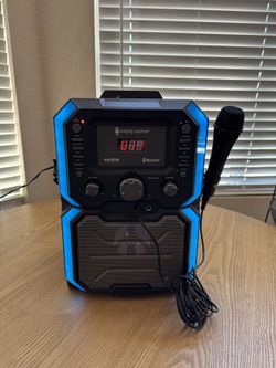 Karaoke machine And One mic (Bluetooth) 