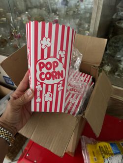 Pop corn and popcorn containers