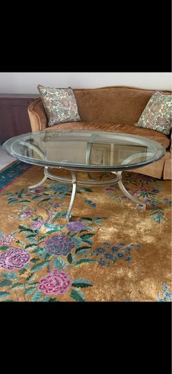 Glass top cocktail table