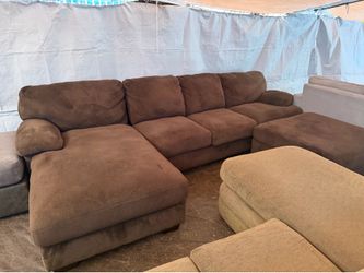 Brown Couch comes with almond great conditions clean we sell all the time delivery $40 local