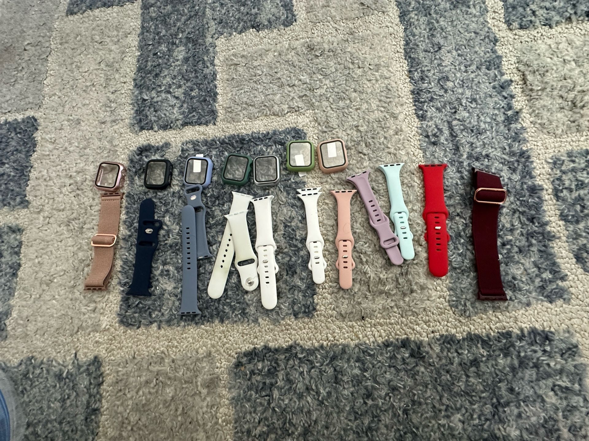 Multiple Apple Watch SE watch bands and covers