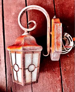 WALL MOUNT WROUGHT IRON VINTAGE RUST COLOR LAMPS WITH LIGHT SENSOR $10 each 3 Available