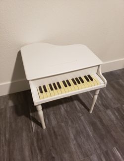 White Schoenhut Miniature Piano