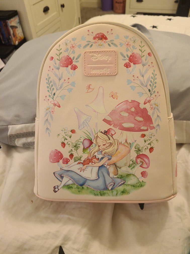 NWT. Alice Sleeping Loungefly Mini Backpack. 