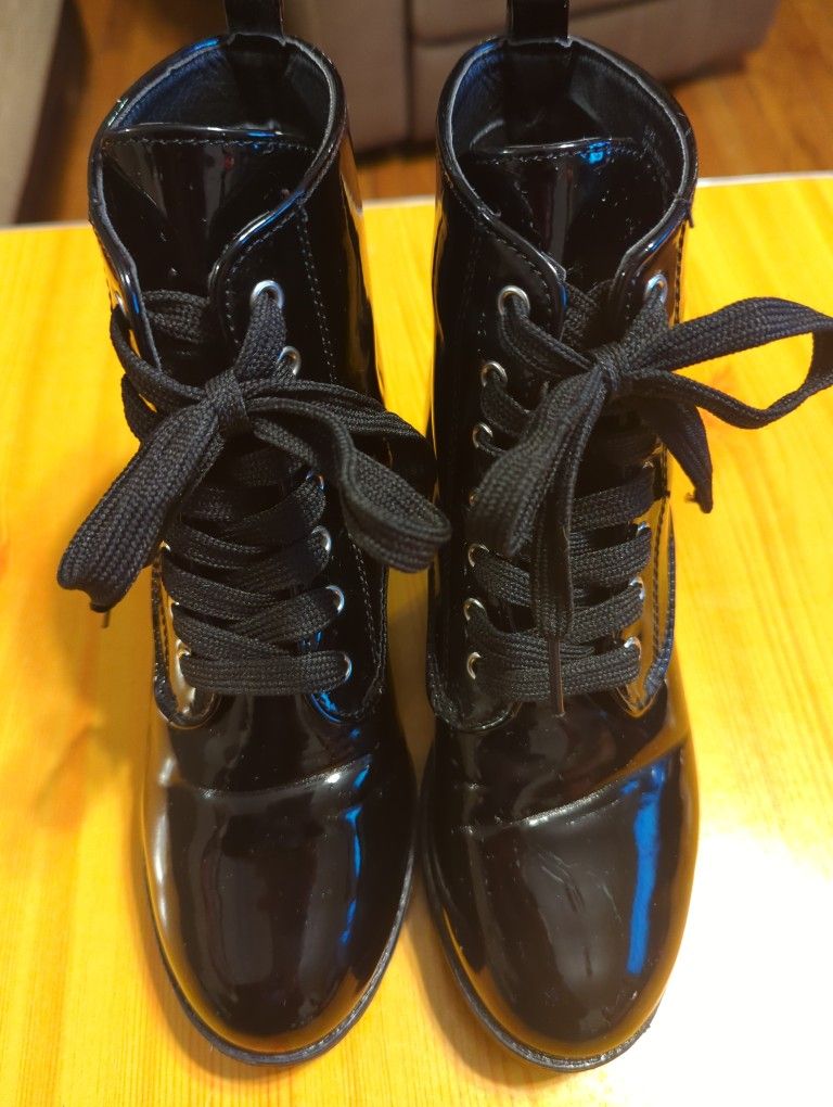 Women's Black Patent Laceup Boots.