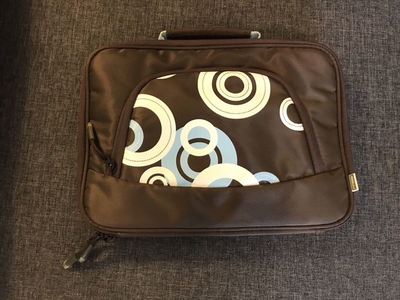 Brown and white iPad notebook laptop case