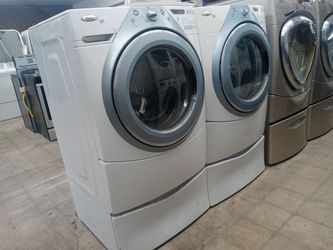 Whirlpool Duet front load washer and dryer set on pedestals - Free delivery