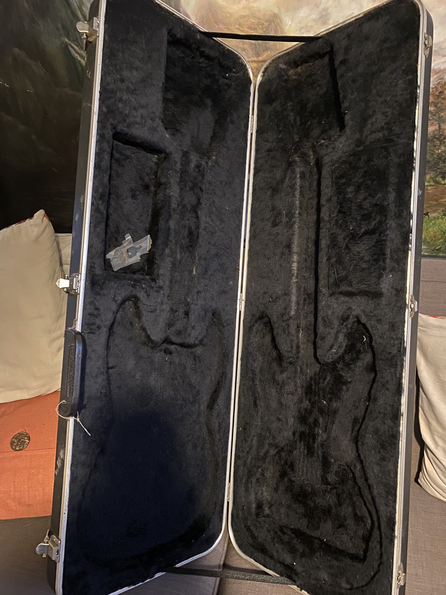 Two Vintage Travel Guitar Cases