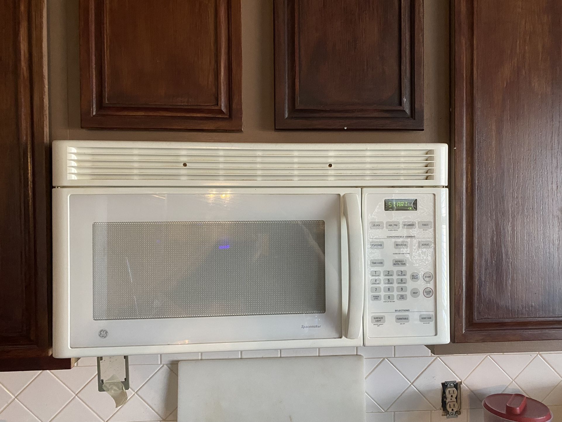 GE SpaceMaker Microwave (above range)