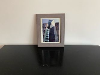 Abstract wall painting in gray wood frame