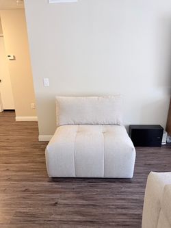 Cream Tufted Armless Chair
