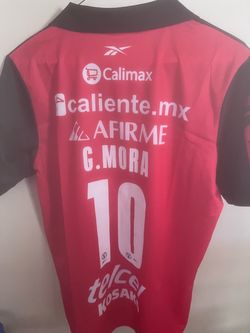 Xolos de Tijuana home soccer jersey G. Mora# 10 size Small, M, 2XL, and 4XL.