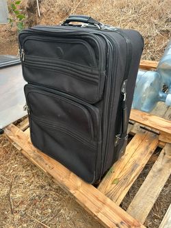 Black Soft-Shell Rolling Suitcase. Dimensions in pics.