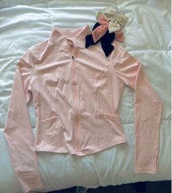 Brand new woman’s (size XS)  baby pink yoga sweater