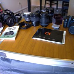 2 DLSR Cameras, Lens, Accessories And Bags