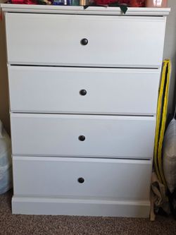 White 4-Drawer Dresser with Dark Knobs